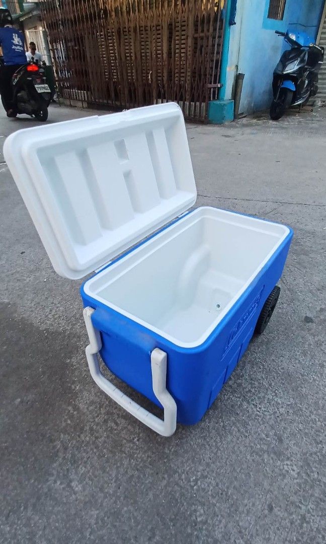 Heavy Duty Cooler with Drain Wheels and Pull Handle on Carousell