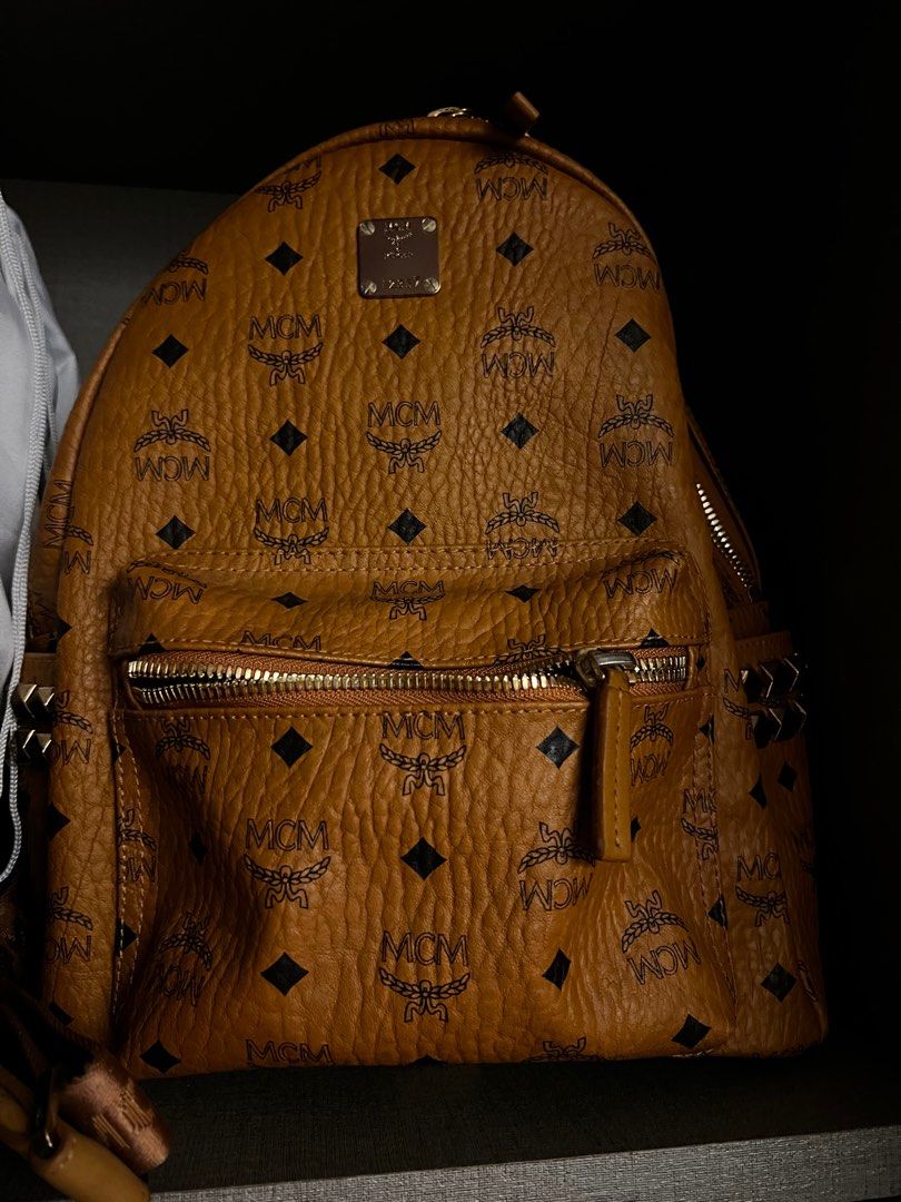 Mcm backpack small best sale medium