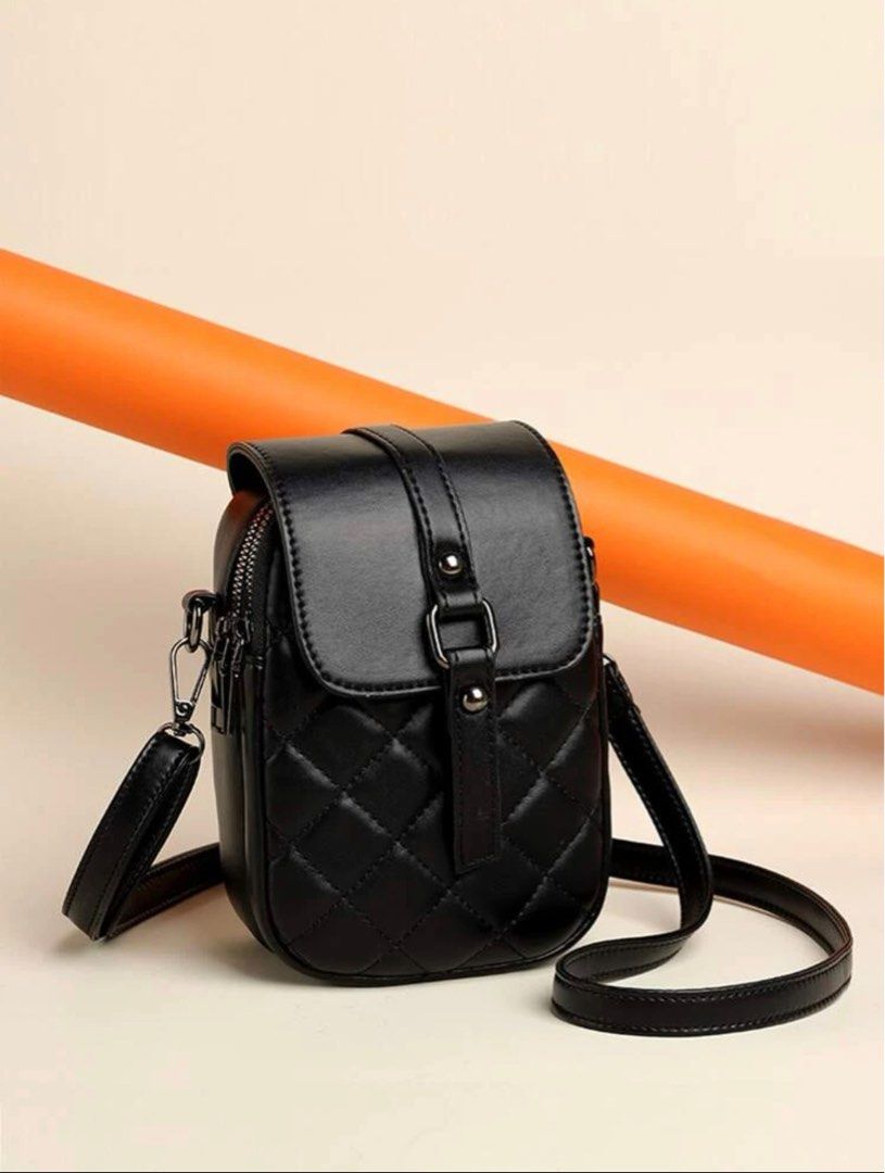 Quilted black crossbody purse top
