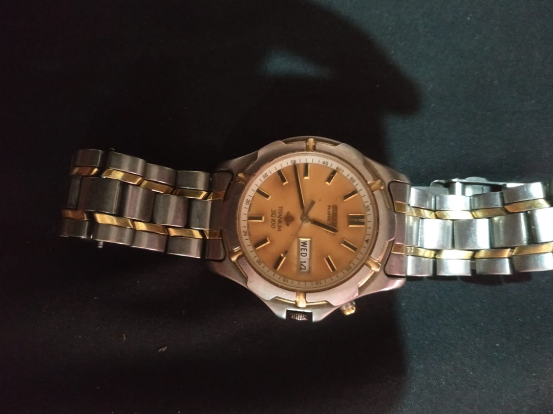 Seiko kinetic titanium sq100 deals