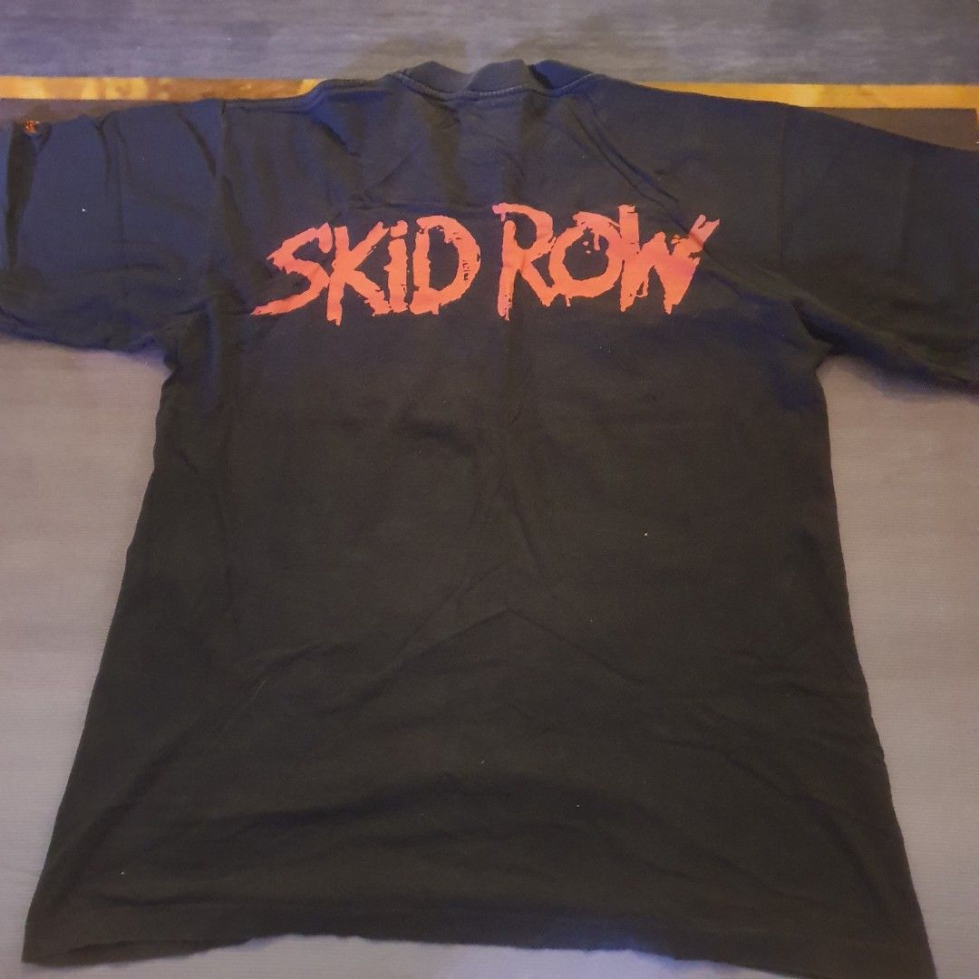 Skid-Row (Category: Tshirts & Polo Shirts) located in Singapore. Submitted by pin922 (Listing ID 1237389641, Image 3). Description: printing still in good condition. pm for more info.