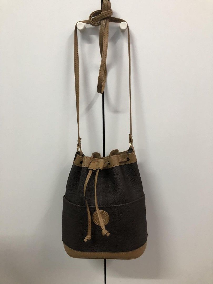 Sling bag bucket, Women's Fashion, Bags & Wallets, Cross-body Bags on  Carousell