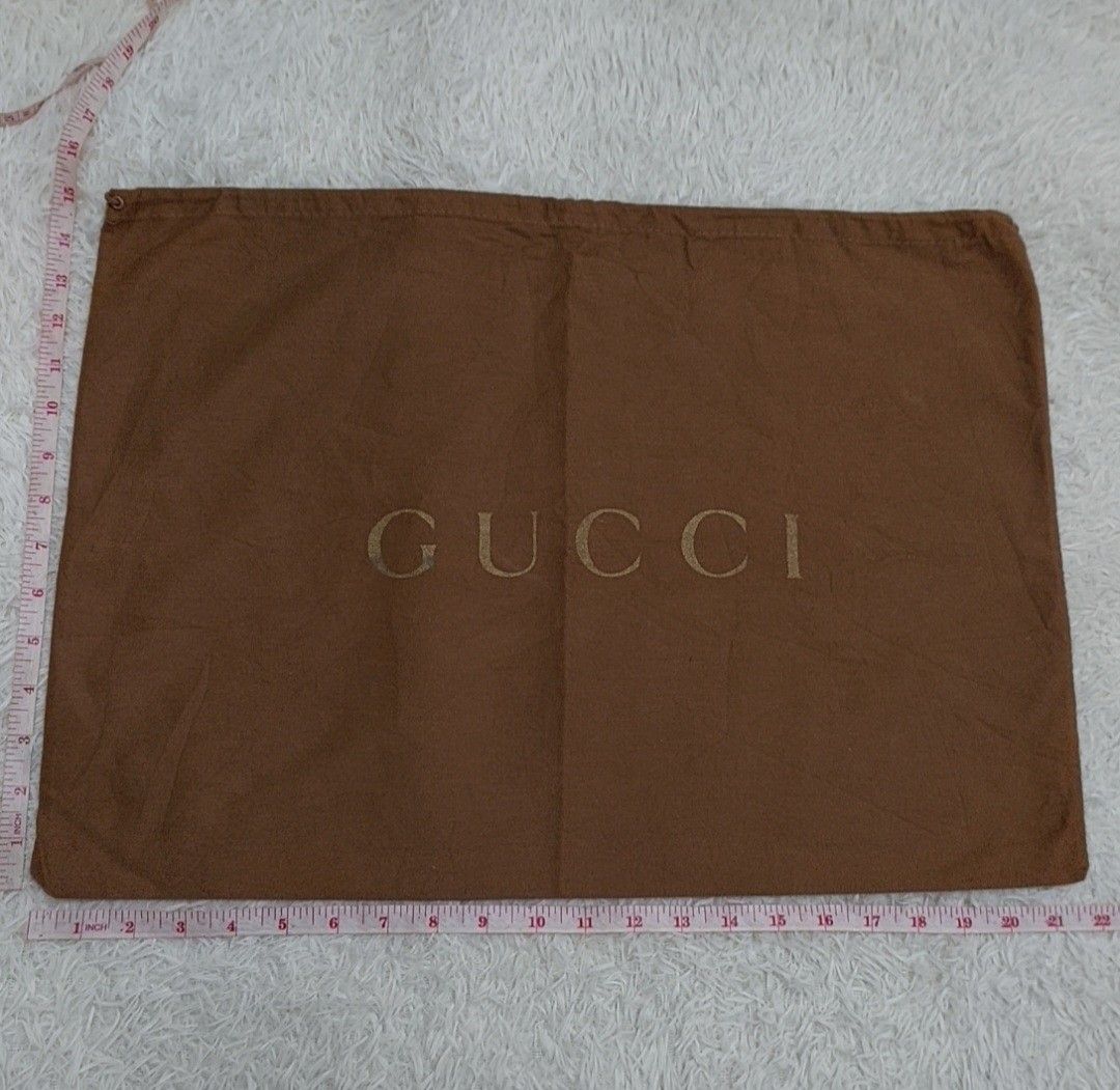 Authentic Gucci Dust bag 15x21.5 inches (Category: Luxury Bags & Wallets) located in Manila. Submitted by jfluxury.co (Listing ID 1237610698, Image 2). Description: excellent condition no flaws bought in Japan 🇯🇵 💯% Authentic. 😊 Money back guarantee. 😊 Clean and ready to use na po.