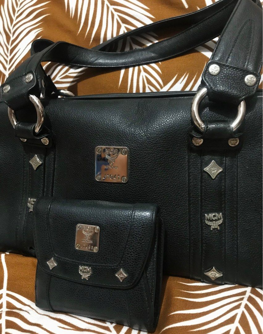 ✨DROP YOUR PRICE :) PM ✨ BUNDLE Authentic McM 😍🥰 (Category: Luxury Bags & Wallets) located in Manila. Submitted by prelovedbagsandclothes.ph (Listing ID 1237610959, Image 2). Description: 20% OFF!!! ORIGINAL GUARANTEE! McM Hobo shoulder bag and Mcm Bifold wallet 😍🥰 ☑️ Genuine leather, it won't just collapse ☑️ turnable screws ☑️ YKK puller Zip -naka Mcm po lahat ☑️ With serial code on metal plate ☑️ With tag (made in Korea) .