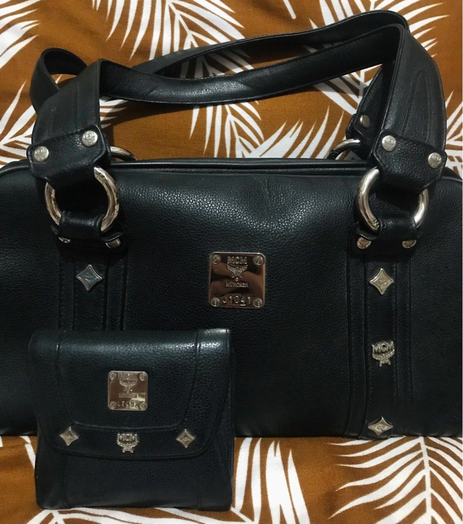 ✨DROP YOUR PRICE :) PM ✨ BUNDLE Authentic McM 😍🥰 (Category: Luxury Bags & Wallets) located in Manila. Submitted by prelovedbagsandclothes.ph (Listing ID 1237610959, Image 3). Description: 20% OFF!!! ORIGINAL GUARANTEE! McM Hobo shoulder bag and Mcm Bifold wallet 😍🥰 ☑️ Genuine leather, it won't just collapse ☑️ turnable screws ☑️ YKK puller Zip -naka Mcm po lahat ☑️ With serial code on metal plate ☑️ With tag (made in Korea) .