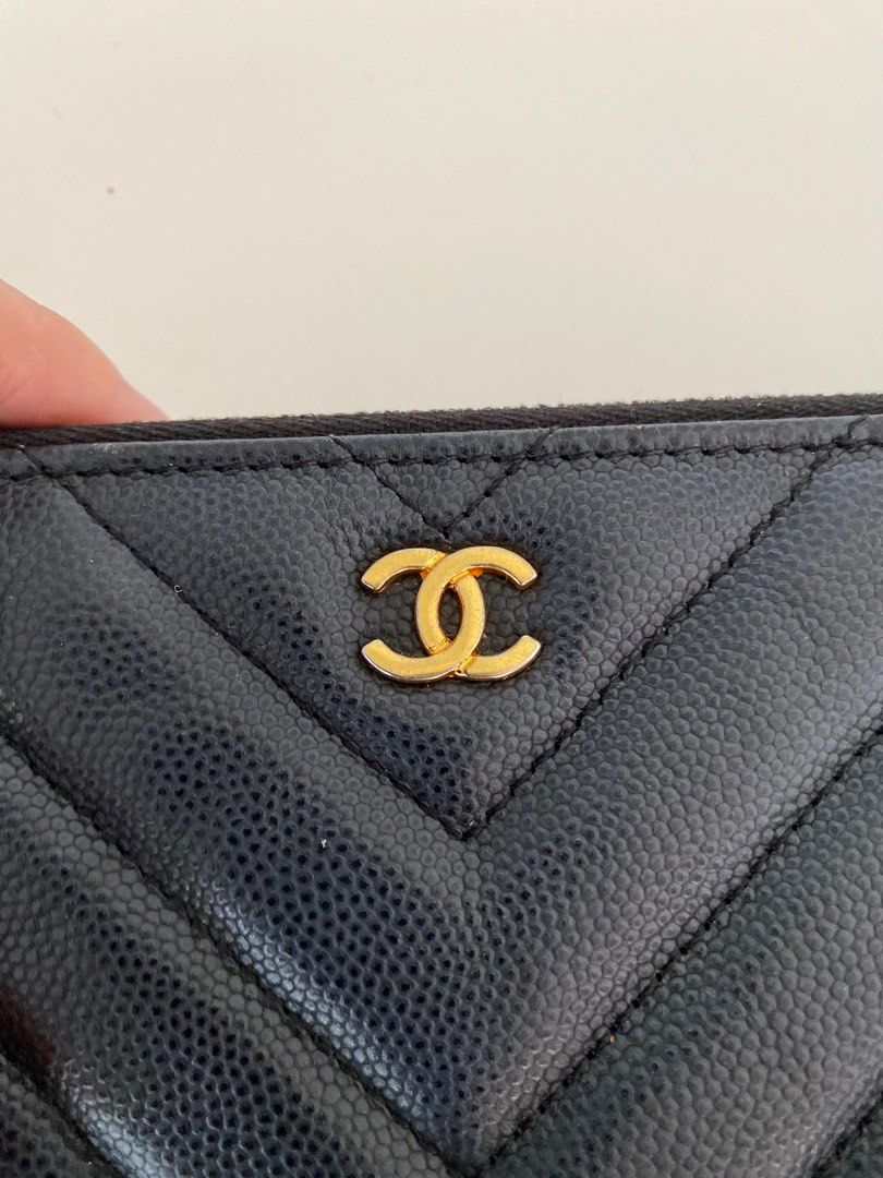 Chanel Chevron Greek charm case (Category: Luxury Bags & Wallets) located in Iba. Submitted by luxurused (Listing ID 1237539621, Image 3). Description: lightly used item PLEASE SELF AUTHENTICATE kept in storage with serial and CC underzip issue: faded metal charms kayo na pa dr leather .