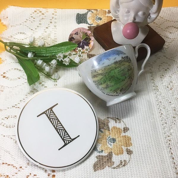 Coaster & teacup set (Category: Coffee & Tea Tableware) located in Mandaluyong City. Submitted by yula_noveltyfinds (Listing ID 1237534319, Image 2). Description: Perfect for a cottage core or shabby chic themed setting - England surplus - ceramic coaster and teacup - with very minimal gold rubs - coaster size approx: 4 inches (diameter) - cup size approx: 4 inches (width including handle) x 2.5 (h) Actual product color may vary from the images s