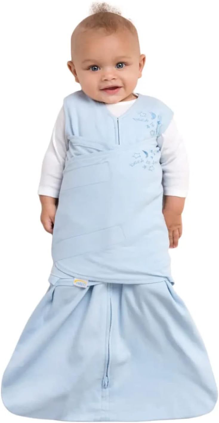 Baby gets arms out of shop halo swaddle