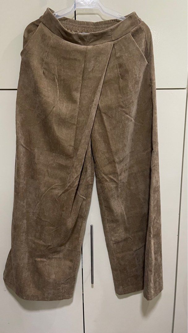 Light Brown Corduroy Wide Leg Pants (Category: Other Bottoms) located in Antipolo. Submitted by patsconcep (Listing ID 1237593778, Image 1). Description: Light Brown Corduroy Wide Leg Pants No brand Lightly used no issues Garterized waist fits 27-30 W13 L38.5 Leg opening 13.