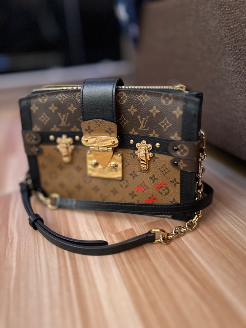 Lv trunk clutch price store