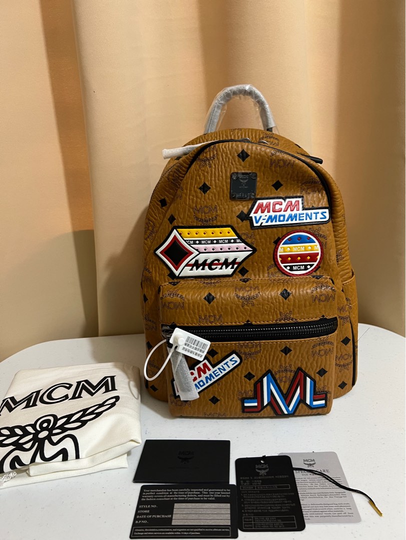 Mcm backpack with patches on sale