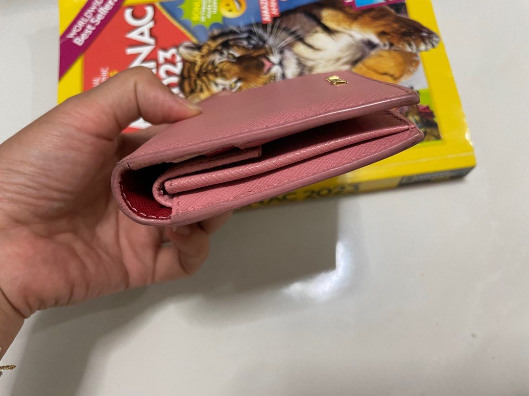 Prada Wallet (Category: Wallets & Card Holders) located in Singapore. Submitted by joeyzg (Listing ID 1237673199, Image 3). Description: Condition good, very nice pink colour. Wallet only, no more box and card..