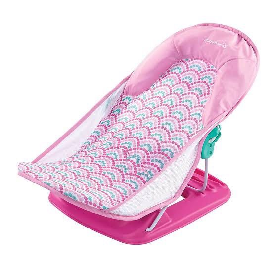 Summer Infant Baby Bath Seat (Category: Bathtub & Bath Accessories) located in Mandaluyong City. Submitted by nev617 (Listing ID 1237656280, Image 1). Description: Safely and securely bathe your newborn in comfort with the Deluxe Baby Bather. A soft, mesh sling cradles your baby, while multiple recline positions provide the most comfortable positioning for your little one, making it the perfect choice from the very first sponge bath. Features: *3
