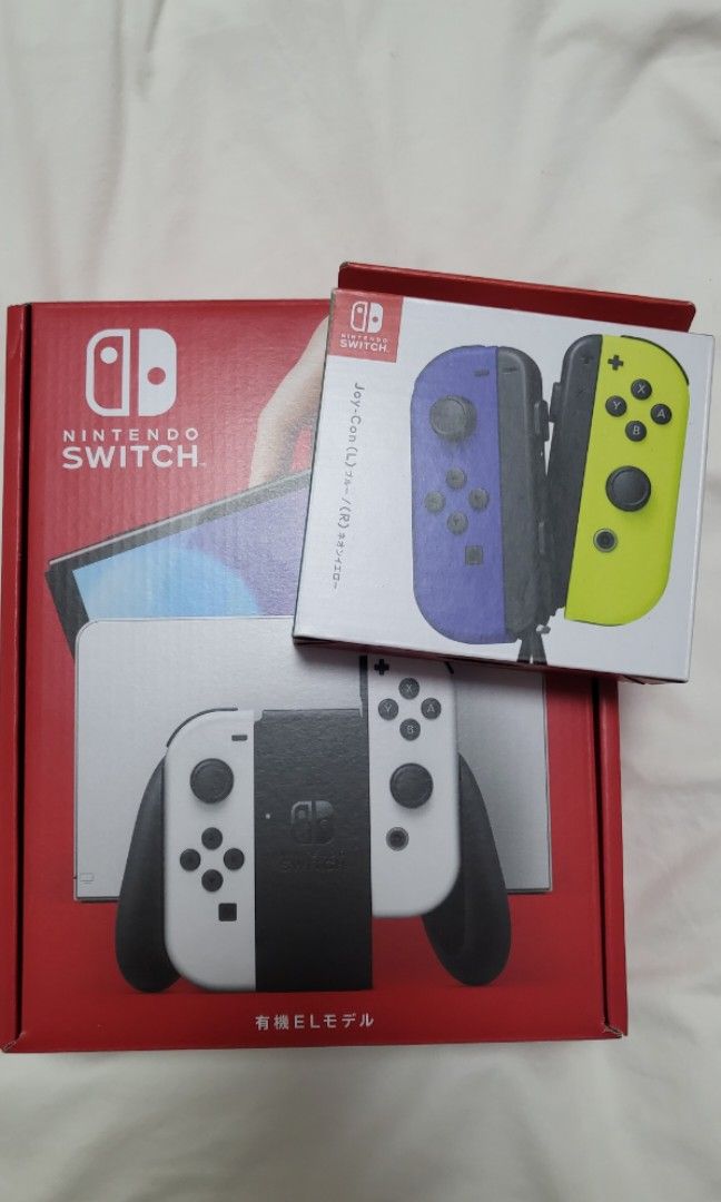 Switch OLED + 2 joy con (JP) (Category: Nintendo) located in Singapore. Submitted by merrypea (Listing ID 1237649531, Image 1). Description: Brand new. Bought in Japan in May 2023. This is a type-A plug, which is two straight prongs, but works with a normal two pin adapter. Voltage/ interface is the same..
