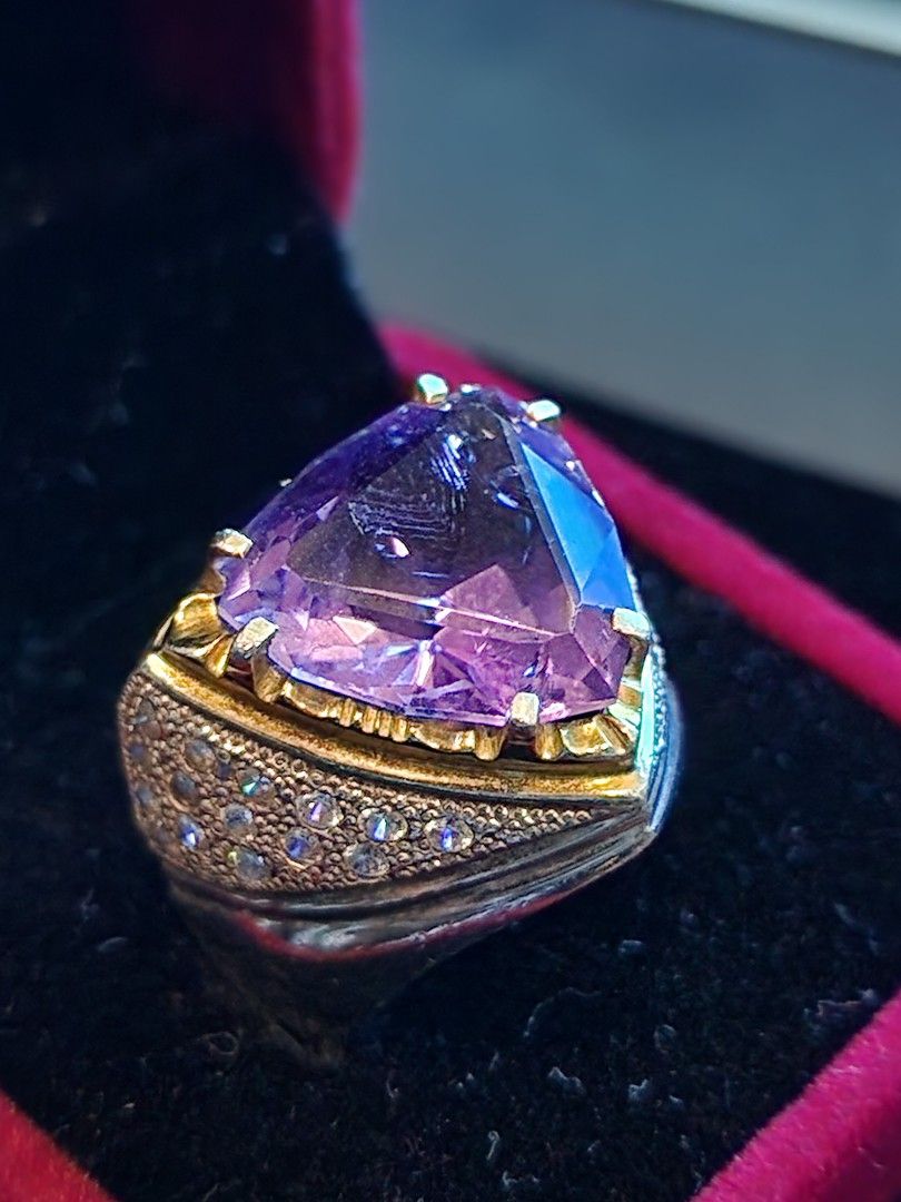Amethyst (Category: Accessories) located in Kuala Lumpur. Submitted by toemito (Listing ID 1237831357, Image 3). Description: Ring : Full Silver (Not 925) Ring Size: 22 (Hand made) Stone colour: Purple Weight: 12++ crt Condition: High inclusions Amethyst (Kecubung Symbolizing strength, power and courage, amethyst is a protective stone. Furthermore, amethyst helps combat negativity of stress and anxiety, so many people meditate with it just to cle