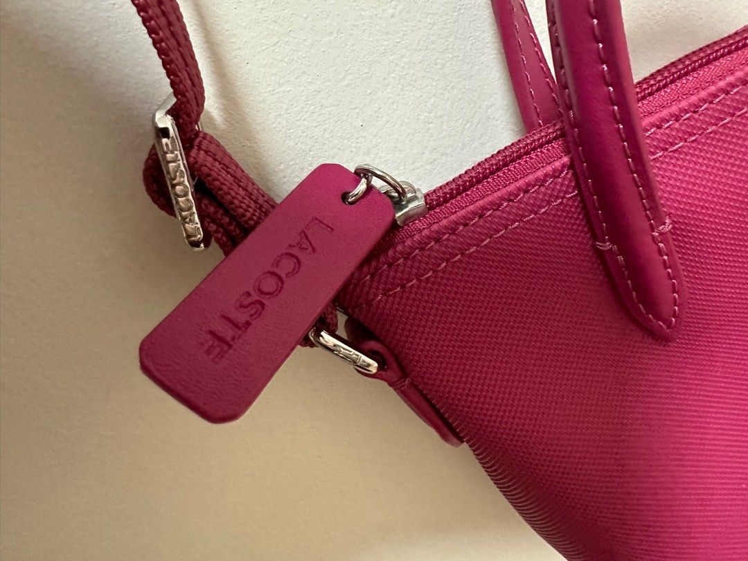 Lacoste fake vs original bag hotsell