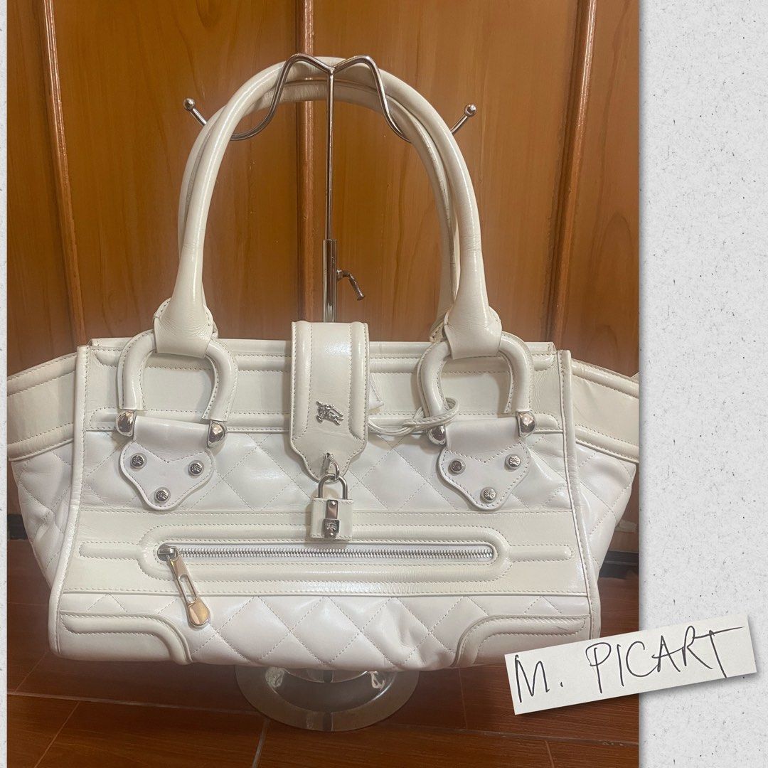Burberry Manor (Category: Luxury Bags & Wallets) located in Legazpi City. Submitted by brandedstuffphl (Listing ID 1237716621, Image 1). Description: Leather tote.