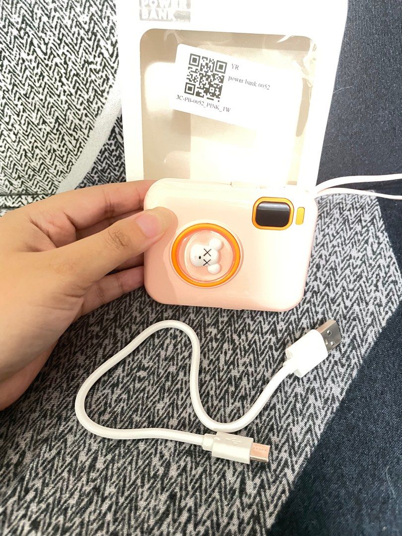 Cartoon Powerbank Pink 10000 (Category: Batteries & Power Banks) located in Makati City. Submitted by cathymars13 (Listing ID 1237827849, Image 2). Description: Just got bought it. For sale for upgrading lang po. Still Nego for sure buyer Additional function: two-way fast charging Applicable type: conventional mobile power supply Cell type: polymer lithium ion cell Shell material: plastic Power capacity: 10000mAh Size: 83 * 64.5 * 25.5mm Charging