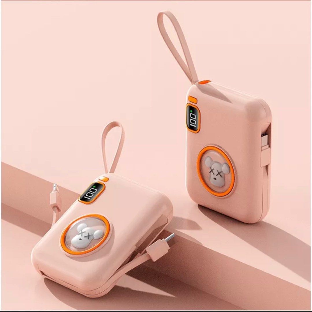 Cartoon Powerbank Pink 10000 (Category: Batteries & Power Banks) located in Makati City. Submitted by cathymars13 (Listing ID 1237827849, Image 1). Description: Just got bought it. For sale for upgrading lang po. Still Nego for sure buyer Additional function: two-way fast charging Applicable type: conventional mobile power supply Cell type: polymer lithium ion cell Shell material: plastic Power capacity: 10000mAh Size: 83 * 64.5 * 25.5mm Charging