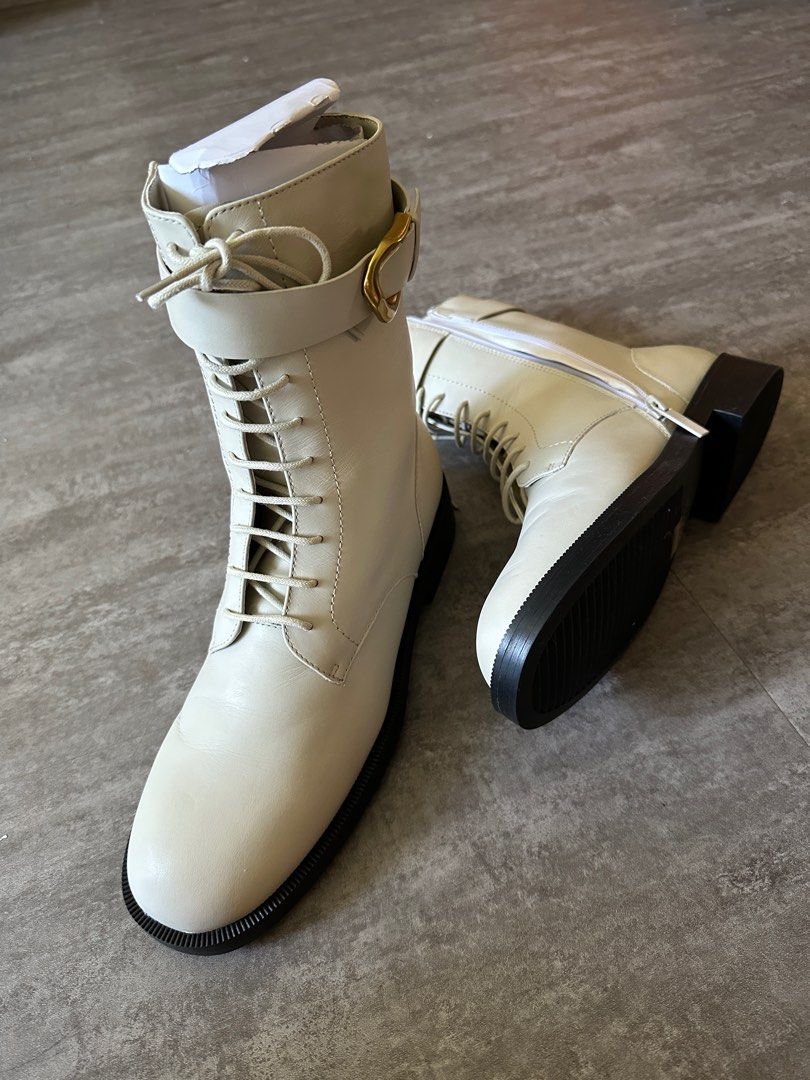 White leather store lace up boots
