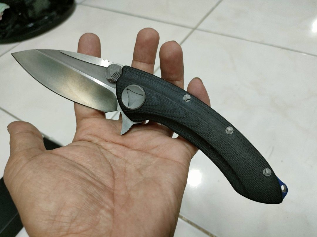 Eafengrow DOC Whaleshark Folding Camping Knife (Category: Hiking & Camping) located in Manila. Submitted by pasyal (Listing ID 1237724413, Image 3). Description: Eafengrow DOC Whaleshark Folding Knife php3,200 D2 steel blade Hollow grind G10 handle Titanium Clip, buttons and screws Discontinued model rare (actual photos) pls check my FB page: Pasyal Heavy Industries Shopee Store: Pasyal Heavy Industries.
