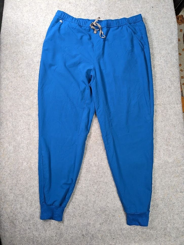 FIGS Tansen™ Royal Blue Jogger Scrub Pants Size XXL Technical Collection (Category: Medical Supplies & Tools) located in Santa Rosa. Submitted by sergids (Listing ID 1237776406, Image 2). Description: FIGS Tansen™ Graphite Jogger Scrub Pants Size XXL Technical Collection Great condition. Graphite gray colorway. Drawstring jogger pant scrubs by Figs, Tansen model. Technical Collection. Drawstring adjustable gartered waist. Multi-pocketed utility w