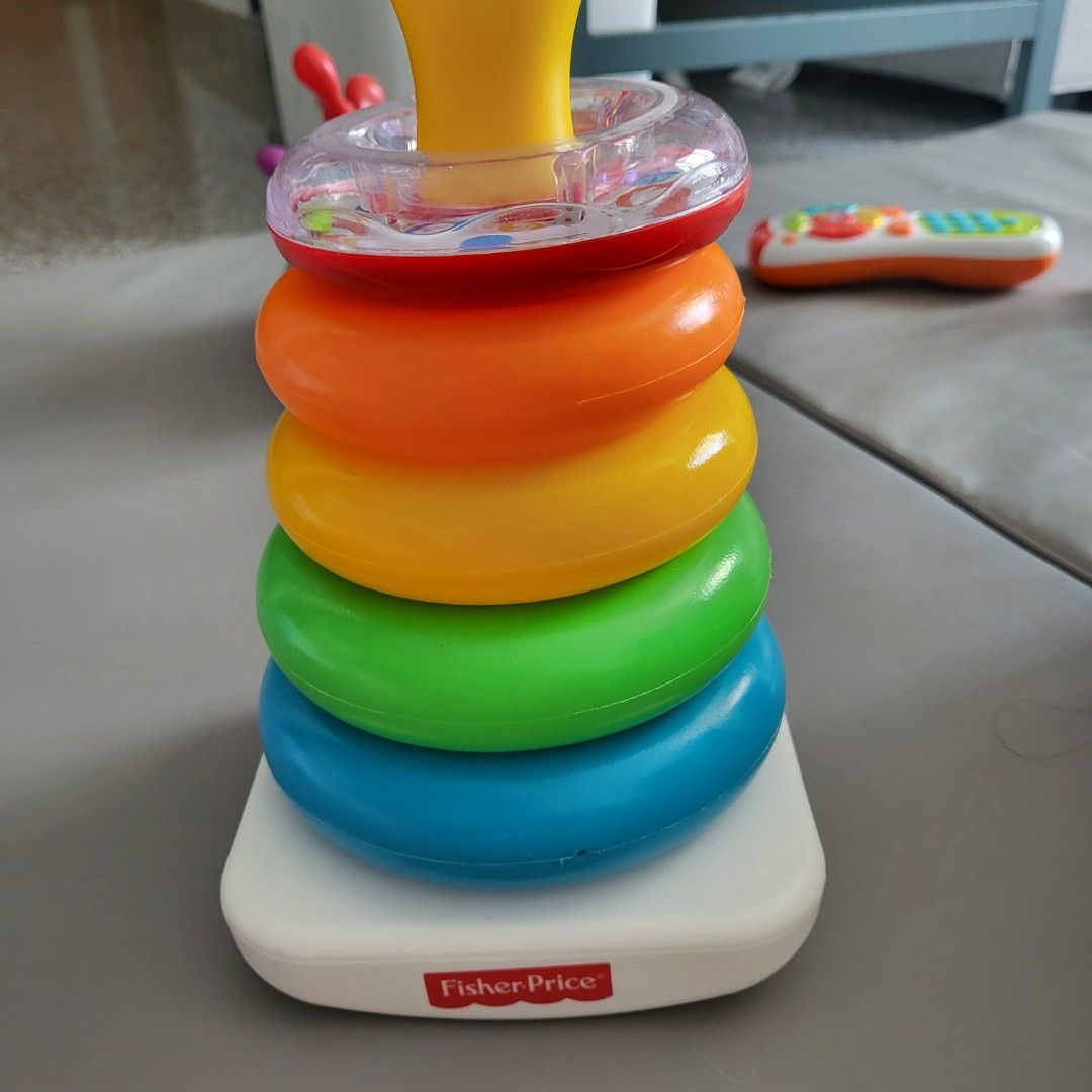 Fisher price stacking donuts, Babies & Kids, Infant Playtime on Carousell