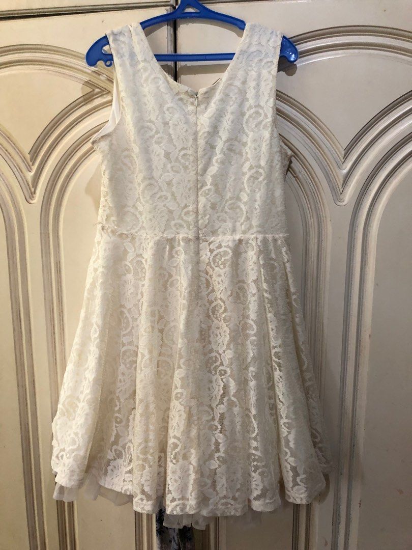 Lacy with floral accent white dress (Category: Dresses) located in Rizal. Submitted by tootchiekloset (Listing ID 1237751298, Image 2). Description: US brand very clean like new kids feom 7-10 years old .