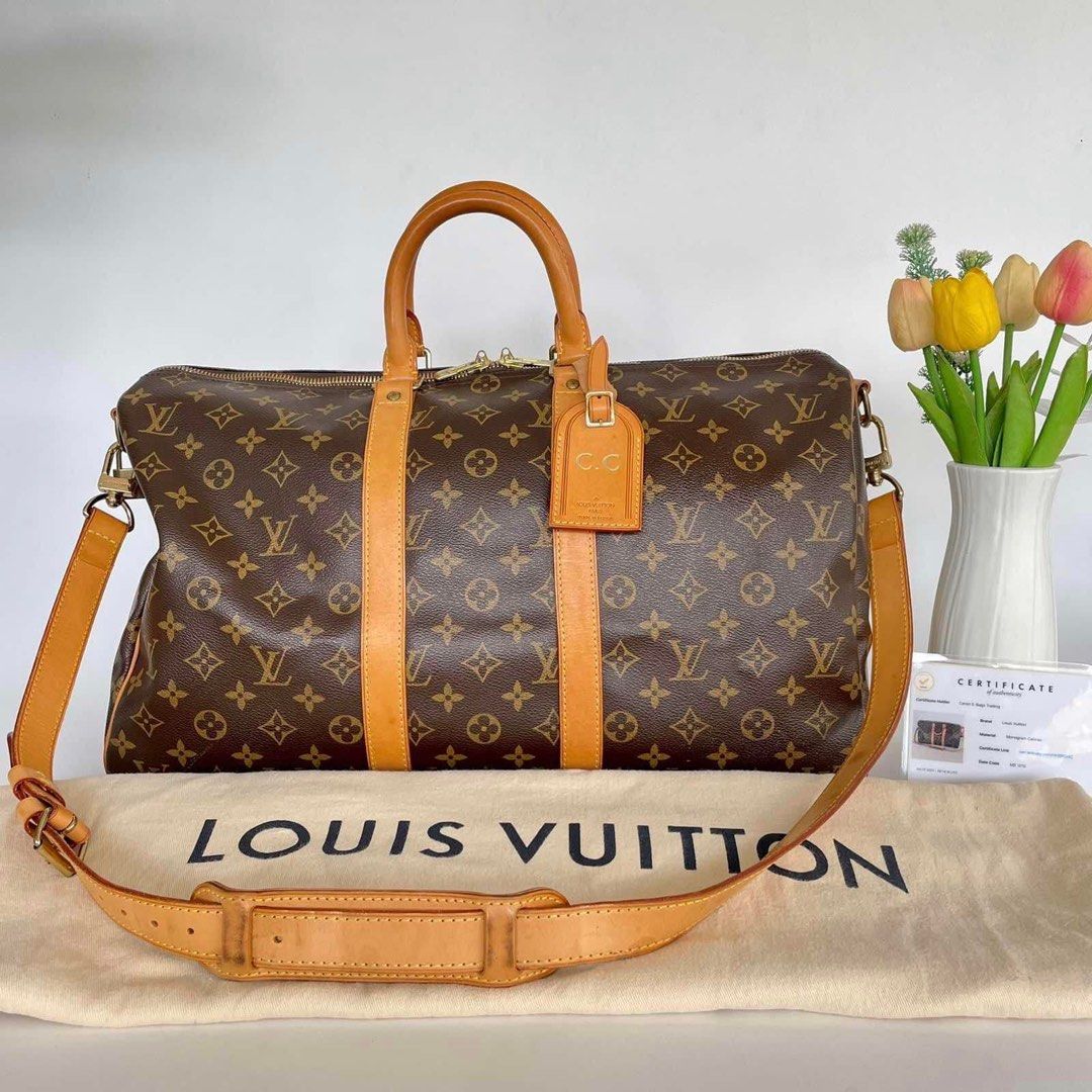 How to spot a fake Louis Vuitton Keepall 55 Bandoulière Monogram 
