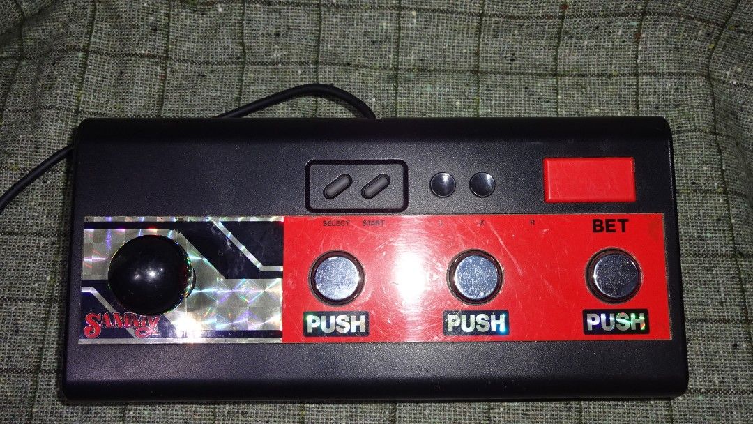 Nintendo Super Famicom Sammy Pachinko Slot Controller (Category: Controllers) located in Paranaque City. Submitted by kutoi.ancheta (Listing ID 1237835289, Image 3). Description: Nintendo Super Famicom Sammy Pachinko Slot Controller Platform: Super Famicom Japan for a variety of Pachinko rom cartridge (excluded) ₱1500 condition: Untested! usual wear and tear! compatibility is buyer's responsibility! as is only! no warranties! pm for inquiries. #n