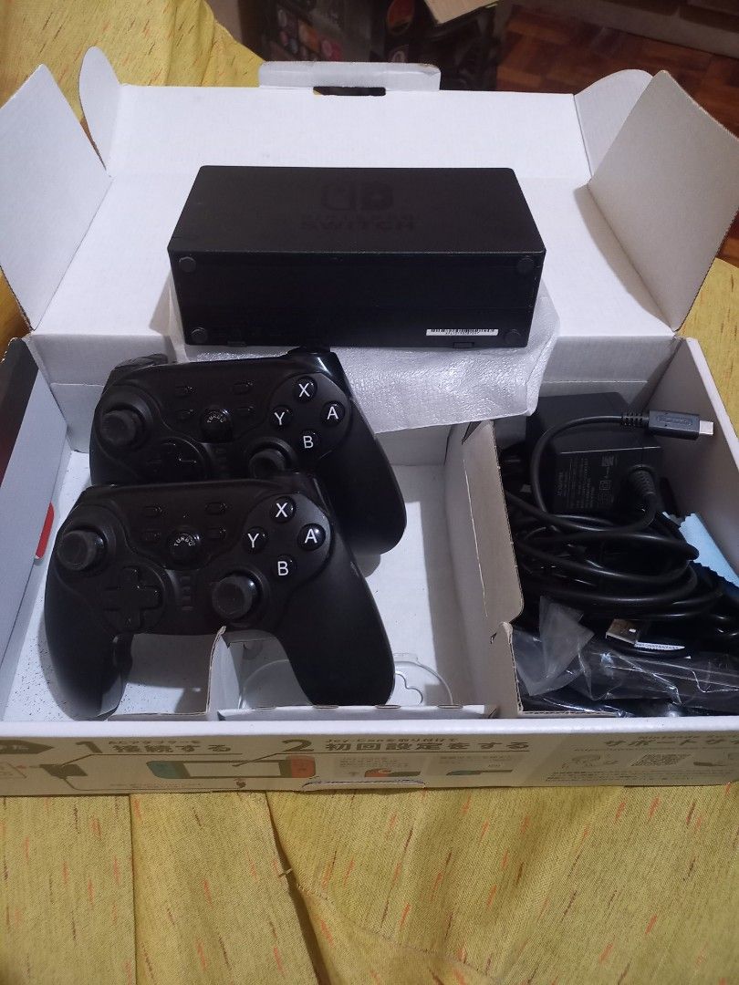 Nintendo switch v1 (Category: Other Gadgets) located in Pasig City. Submitted by cmemo (Listing ID 1237721709, Image 2). Description: can pass as new im not sure if its v1 or v2 complete with 2 joysticks and charger with 2 physical game minecraft and mario odyssey meet up pasig area.