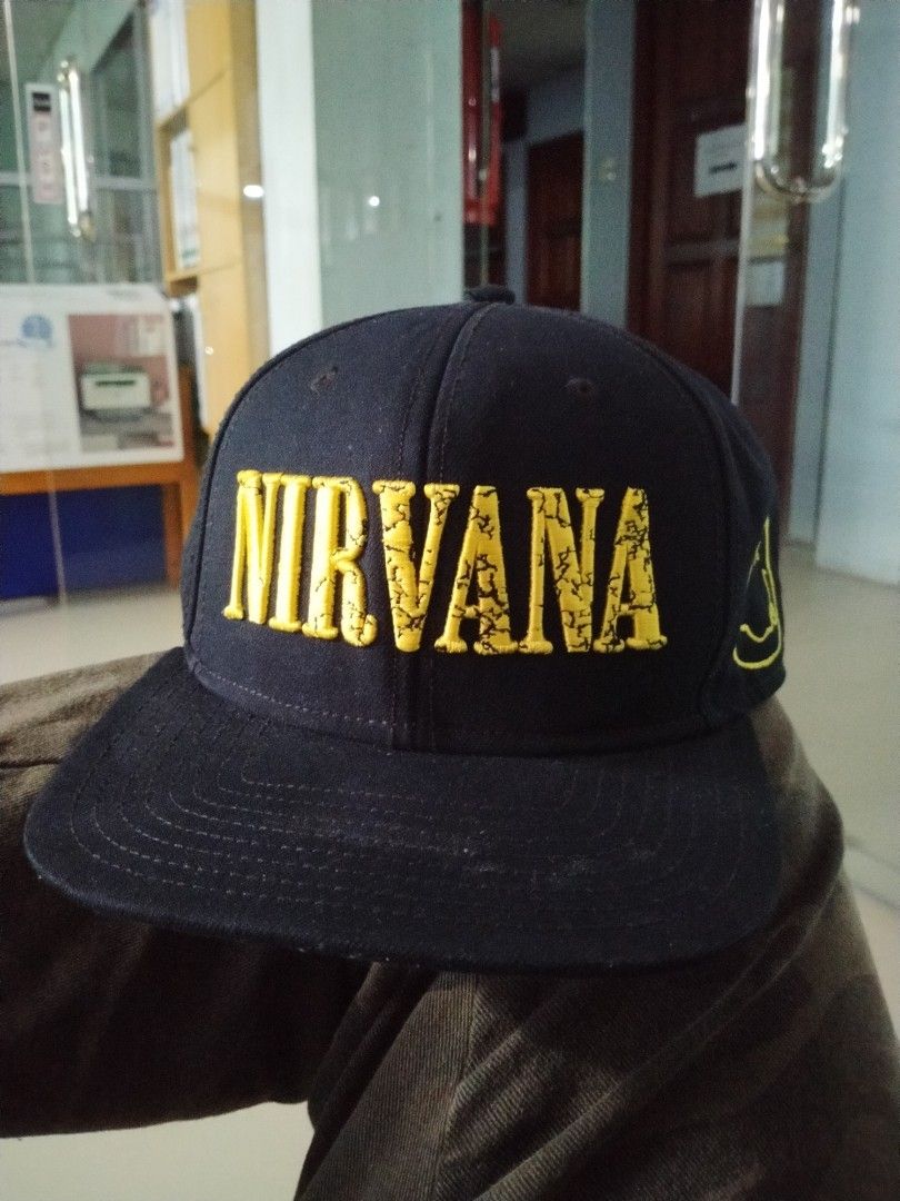 Nirvana snapback cap (Category: Cap & Hats) located in Tenom. Submitted by kimihouse (Listing ID 1237798437, Image 1). Description: kondisi 9/10,tiada kotak & pinhole,brim tiada patah & snapback cum tiada crack.harga siap pos..
