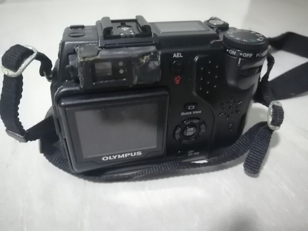 Olympus digital camera (Category: Cameras) located in Singapore. Submitted by declutter1241 (Listing ID 1237854599, Image 2). Description: Retro digital camera from the early 2000s for sale. Works well but abit comestic damage. Comes with accessories. Collect under my block Tags canon nikon sony Panasonic olympus ricoh pentax minolta yashica kycoera powershot kodak fujifilm finepix alpha camedia.