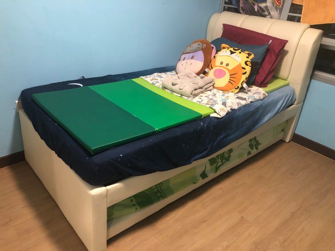 Pull out & up bed (Category: Bed Frames & Mattresses) located in Singapore. Submitted by bellalsree (Listing ID 1237752762, Image 2). Description: Rarely used. Bought it less than 1yr. Used for about 4-5mo by a child. Mattresses covered using waterproof cover and plastic not removed yet though it has torn. Unique: top is super single, bottom single. Open up side by side equals to queen bed. [Top]Super single frame: L 203cm x W 107cm [Bottom]Singl