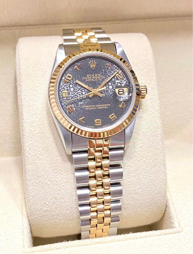 Rolex Datejust 31 Computer/Anniversary Dial (Category: Luxury Watches) located in Pasig City. Submitted by Watchaholics (Listing ID 1237714040, Image 2). Description: Rolex Datejust 31 Computer/Anniversary Dial 31mm Oystersteel and Yellow Gold Reference 68273 9.5/10 Condition 18kt Yellow Gold Fluted Bezel 18kt Yellow Gold and Steel Jubilee Bracelet Sapphire Glass For 370k You may DM or contact @ 09615077138 Thanks admin😉.