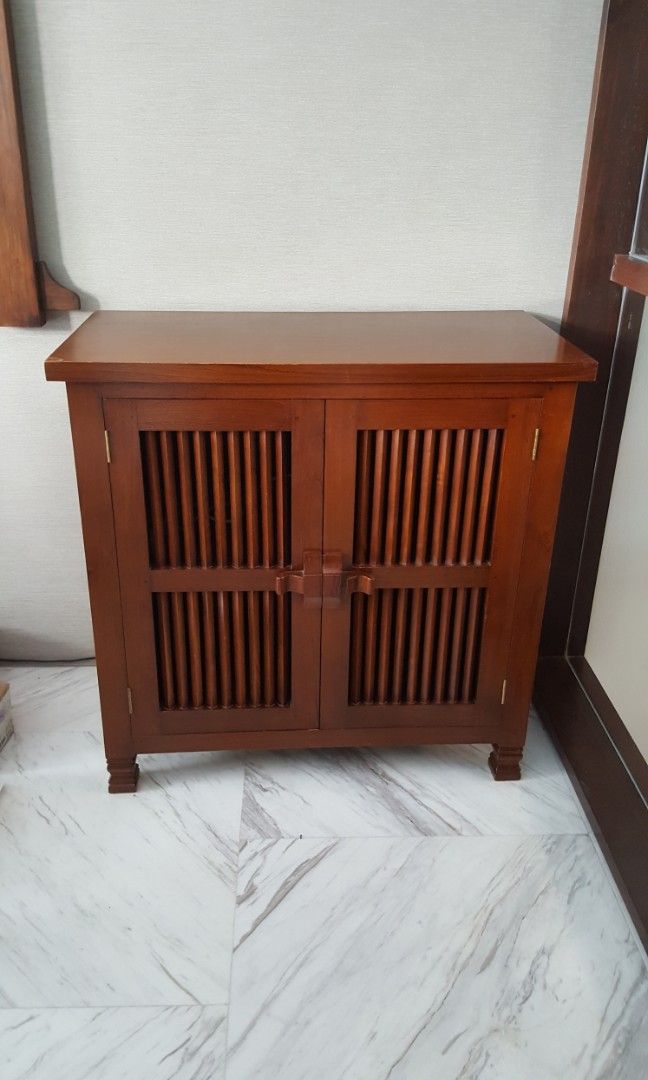 Teak TV Console table (Category: TV Consoles) located in Singapore. Submitted by minniekat (Listing ID 1237709387, Image 1). Description: Small teak TV cabinet Bought from Pasardina dempsey road Dimensions : L80 cm x D41 cm x H80 cm Please arrange own transportation.