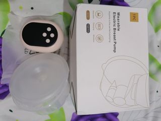 Wearable electric breast pump
