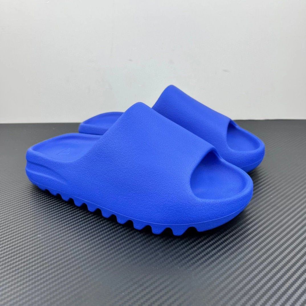 Yeezy Slides Azure (UK 8), Men's Fashion, Footwear, Flipflops and