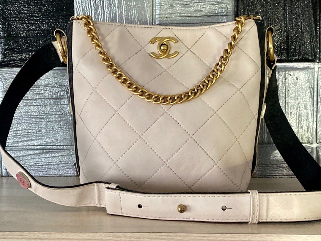 Chanel Calfskin Hobo bag w/ gold tone hardware Chanel Button Up Cream  Calfskin, Grosgrain with Gold Metal Hobo bag. Very un…
