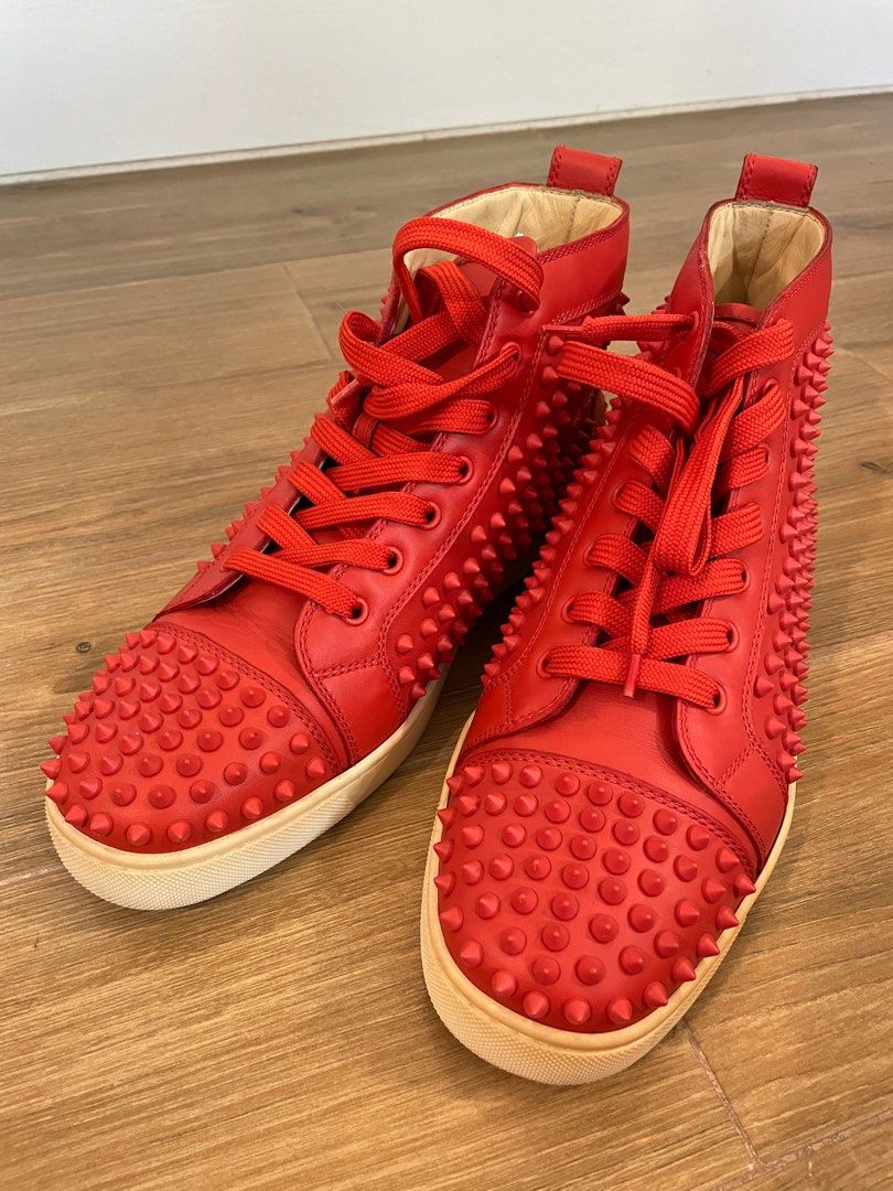 Red louboutin hotsell high tops
