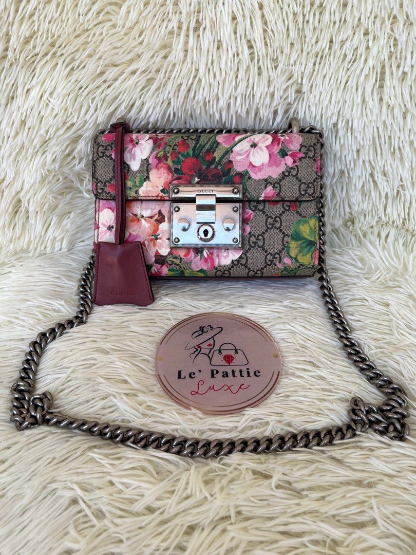 Gucci Blooms Mini Padlock (Category: Luxury Bags & Wallets) located in Las Pinas. Submitted by Le.Pattie.Luxe (Listing ID 1237937890, Image 2). Description: 💯% Authentic Gucci Blooms Mini Padlock 🤎Php 48k🤎 ▪️9/10 condition, normal signs of use only ▪️Inclusions: paper bag, dustbag, clochette, 2 keys, & care card 💯% authentic or your money back ✅DTI Registered ✅BDO Checkout Merchant 💳Online credit card payments are accepted 💳Installment/Buy 
