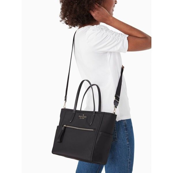Kate Spade Chelsea Medium Satchel (Category: Luxury Bags & Wallets) located in Santa Rosa. Submitted by BerrieBlossom (Listing ID 1238009389, Image 2). Description: - 10.2"H X 14.2"W X 5.2"D - Handle Drop: 5.8" - Strap Drop: 22" - Nylon - Trim: Smooth Pvc - Metal Pinmount Logo - Two Way Spade Jacquard Lining - Interior Front Zip & Slip Pocket - Exterior Top Zip Pocket, Front Zip Pocket, & 2 Side Pockets - Drop In Top Zip Closure.