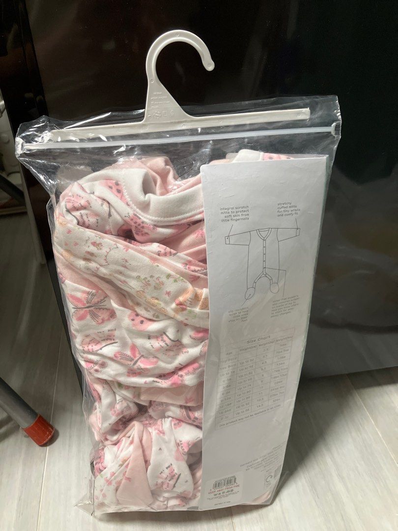 Nutmeg baby sleepsuits top