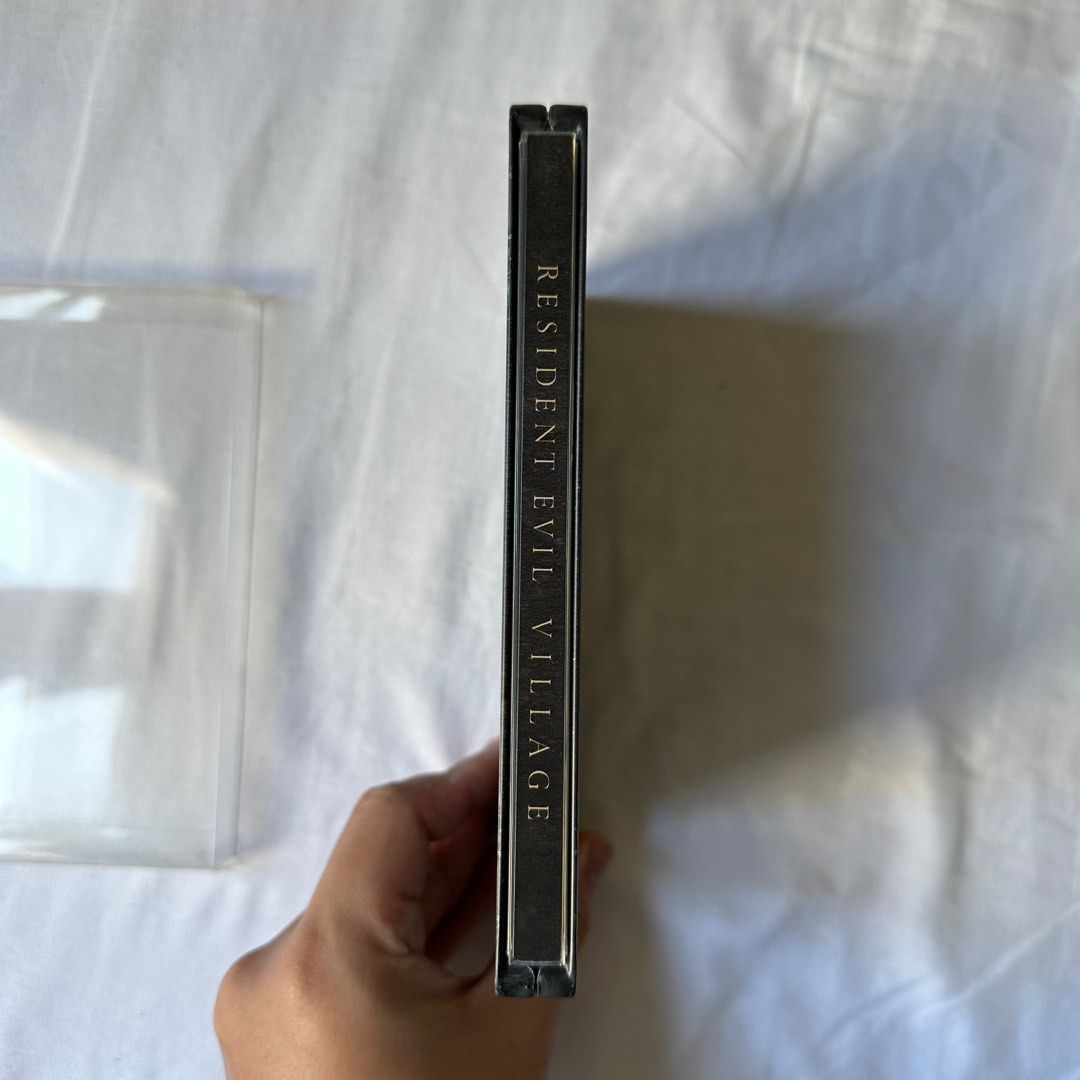 Resident Evil Village Steelcase only (Category: PlayStation) located in Manila. Submitted by sweettotes_ph (Listing ID 1238010626, Image 3). Description: Good condition No issues No game included With protector I have other games feel free to check my listings :) Location: Sta Mesa Manila For pickup or delivery Bdo gcash cod payment.
