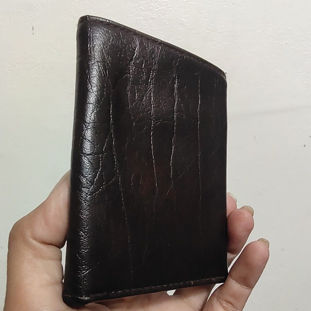 YSL Bifold Leather Wallet (Category: Luxury Bags & Wallets) located in Baguio. Submitted by PreiLoveMaria (Listing ID 1238020362, Image 2). Description: YSL Bifold Leather Wallet Good used condition Signs of wear Kindly refer to the last photo Check detailed photos Shipping via J&T only No COD/COP Pls, manage expectations since this item is from Japan Surplus..
