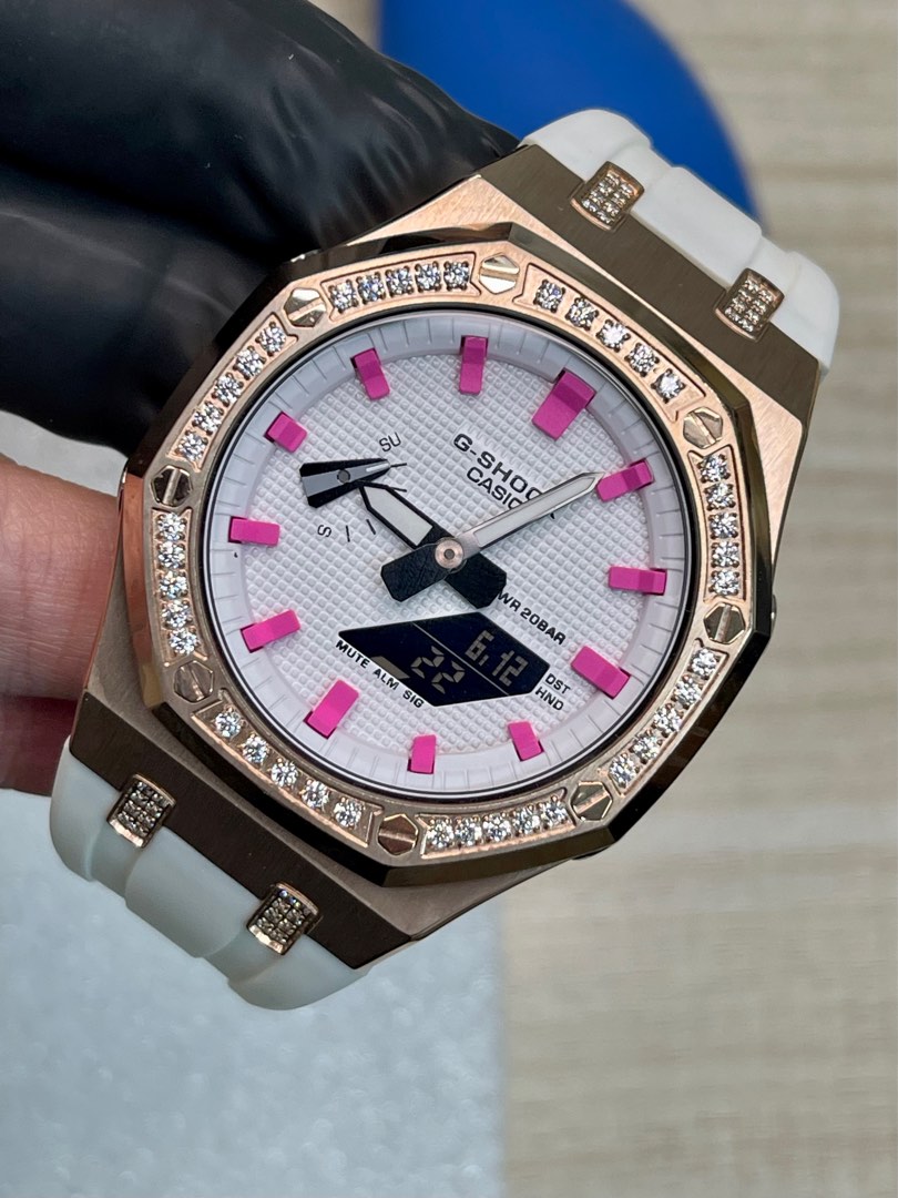 White dial with Pink hour marker on rose gold stainless steel