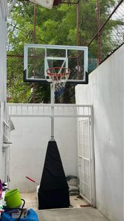 Adjustable basketball ring