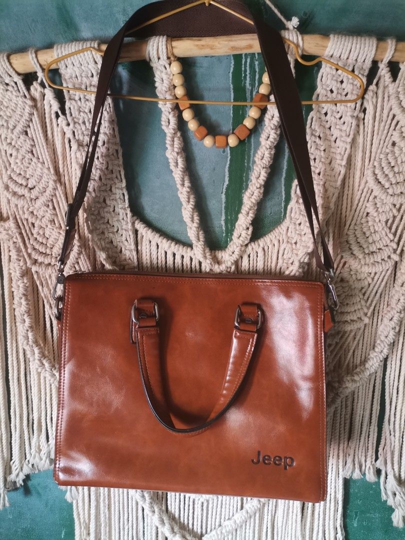 Authentic Jeep laptop/document bag (Category: Briefcases) located in Binangonan. Submitted by mai_uniqk_fynds (Listing ID 1238110759, Image 2). Description: H: 11.5 inches W: 14.5 inches Zipper on outside pocket need replacing No rubs on the body inside is clean.