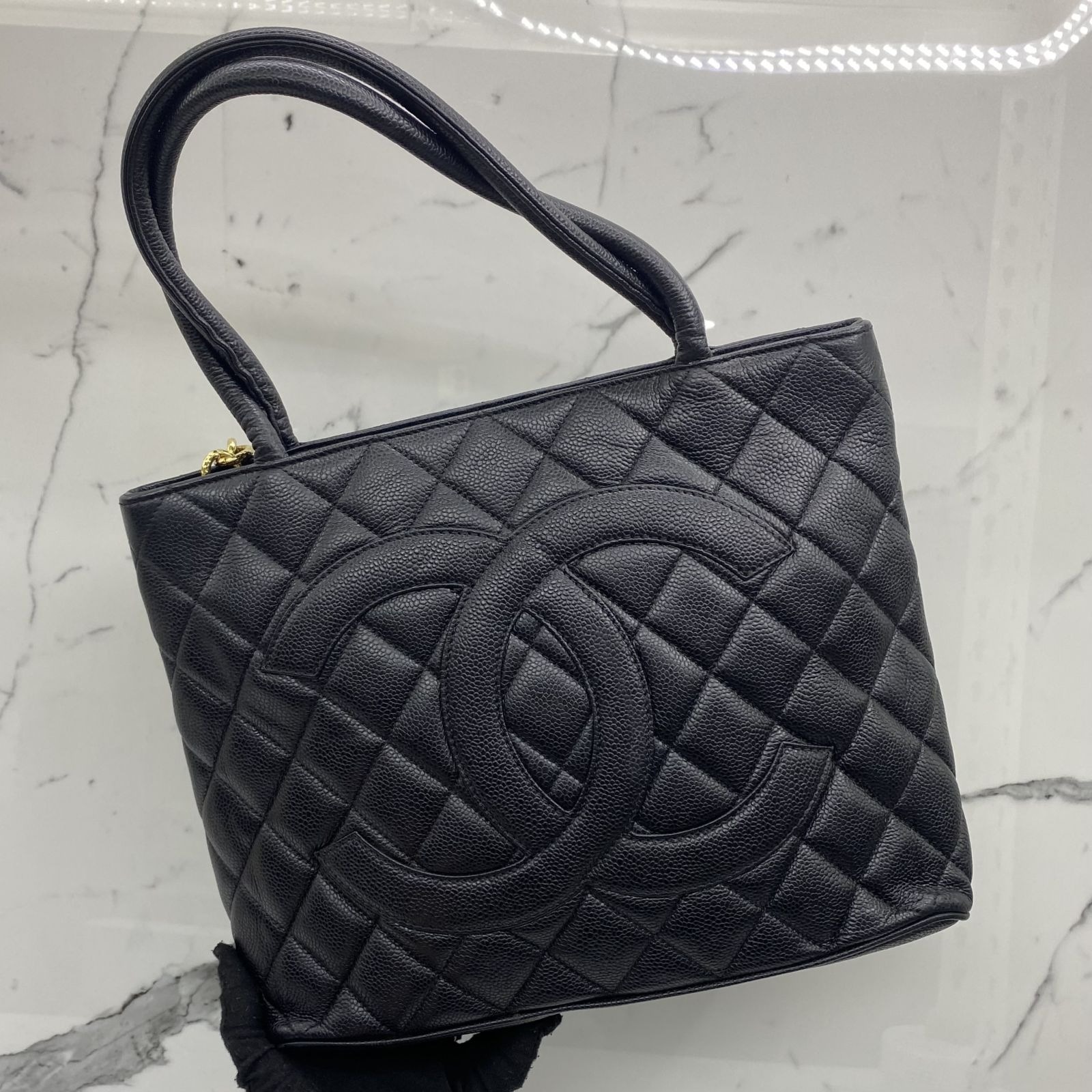 Chanel caviar quilted medallion tote black online