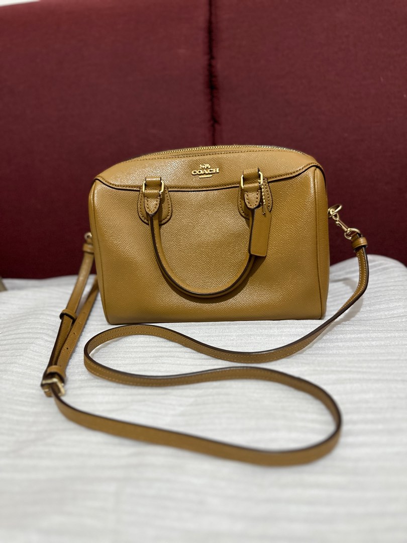 REPRICED!!! COACH SLING BAG (BROWN) on Carousell